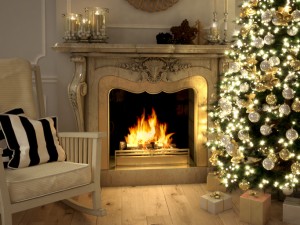 Wood fireplace next to decorated Christmas tree
