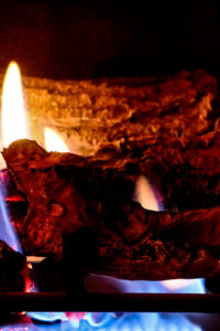 Closeup of Gas fireplace logs and fire