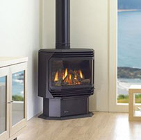 freestanding gass fireplace in a corner