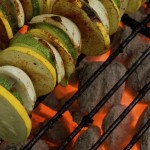 closeup picture of pattypan squash on a charcoal grill
