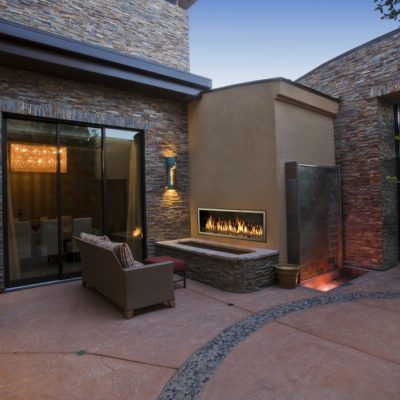 Town and Country outdoor linear fireplace in an outdoor living room setting