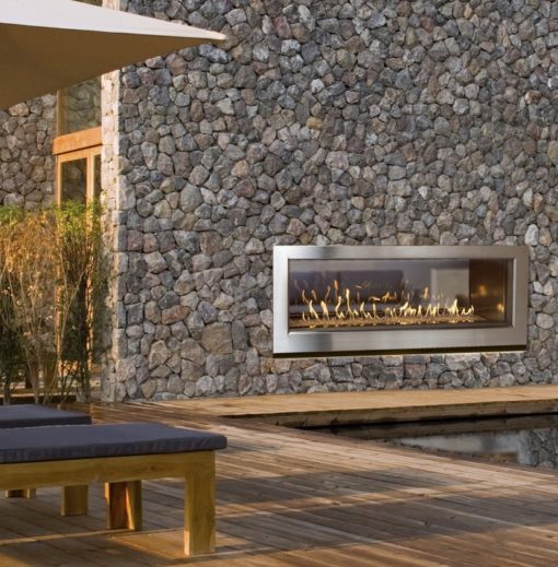 54" Outdoor linear gas fireplaces in stone wall
